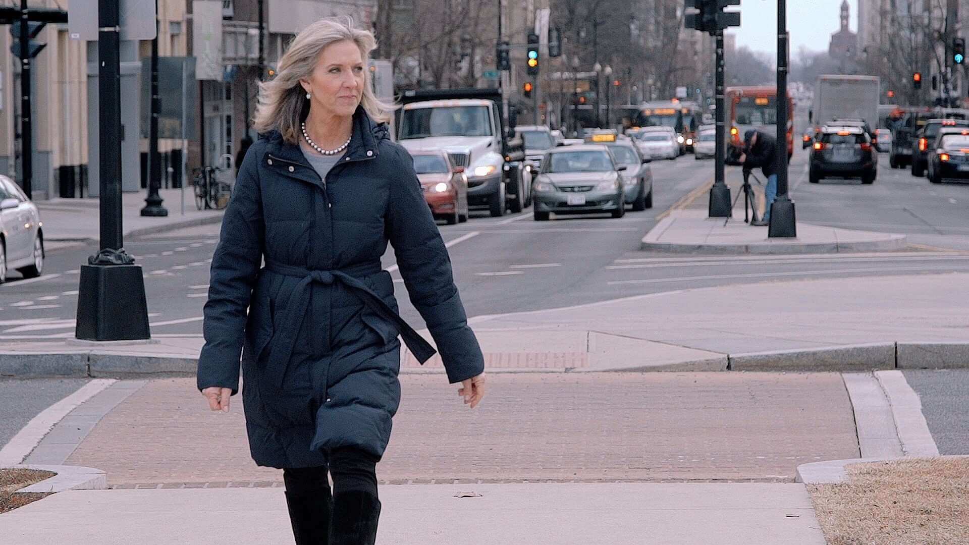 Woman walking alone in a city