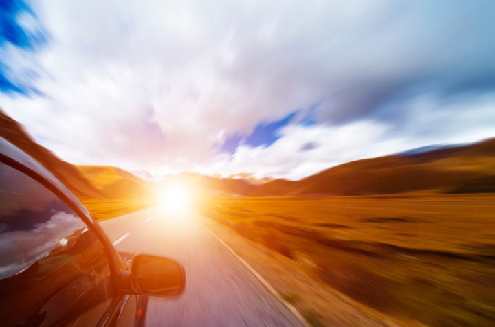 A car driving down a highway quickly