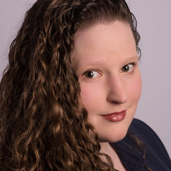 Profile of a woman with a navy blue shirt